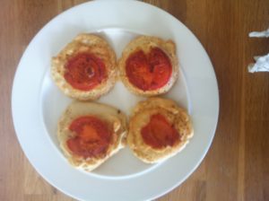 Brown rice flour crackers with humous and fried tomato